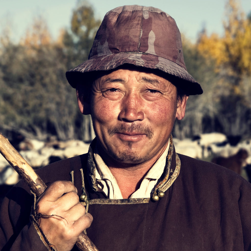 Portrait Of Mongolian Man Farmer Worker Concept